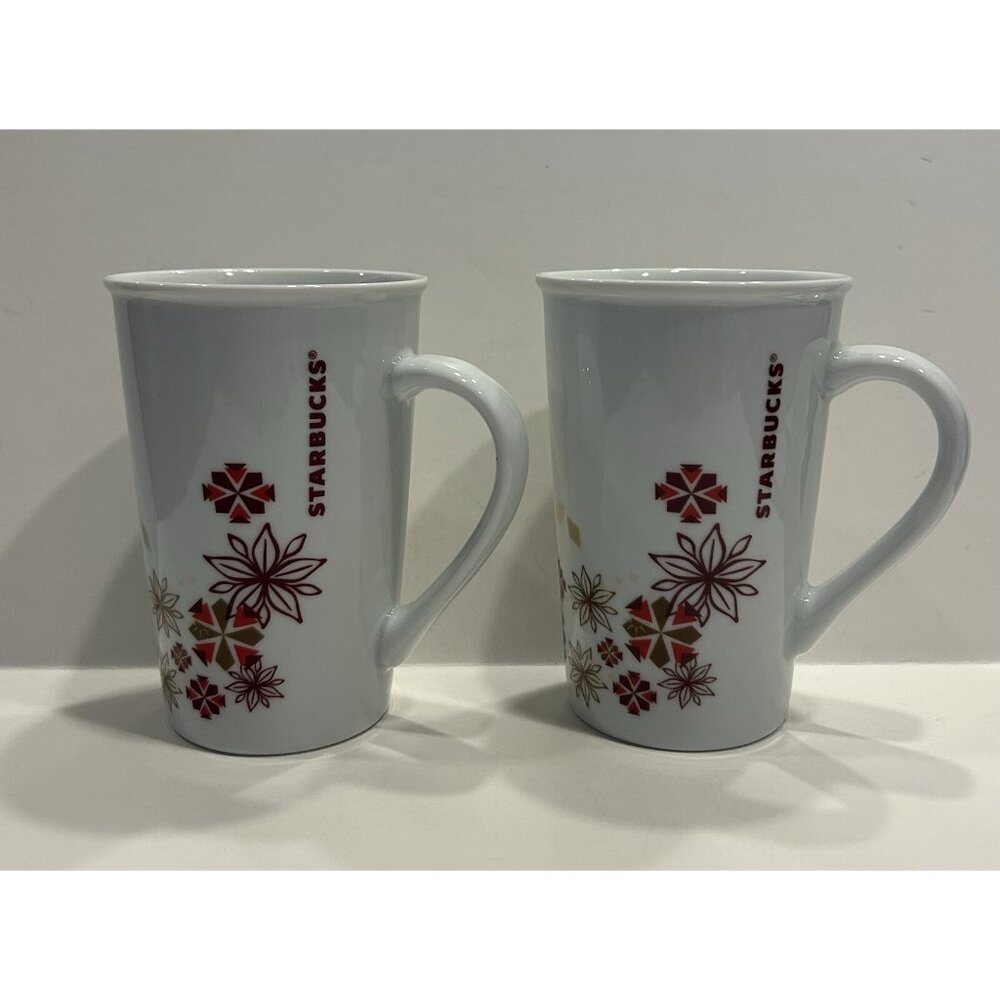 Starbucks Cups Set of 2 Holiday Winter Star Snowflake Poinsettia Christmas 12 oz - Picture 1 of 13
